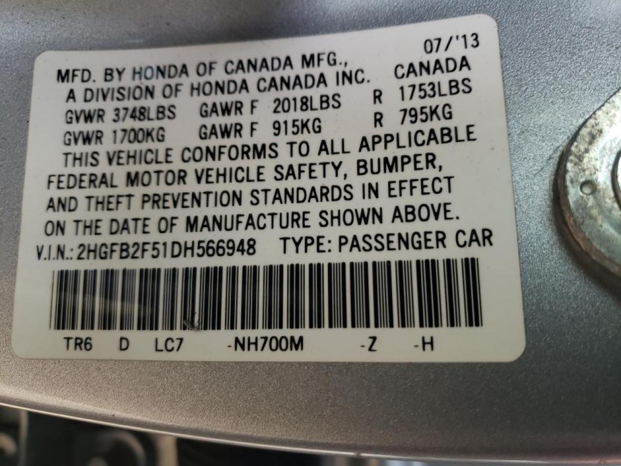 Photo 10 from auction – 2013 HONDA CIVIC LX with VIN 2HGFB2F51DH566948