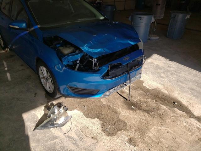 Photo 9 from auction – 2015 FORD FOCUS SE with VIN 1FADP3F21FL353822