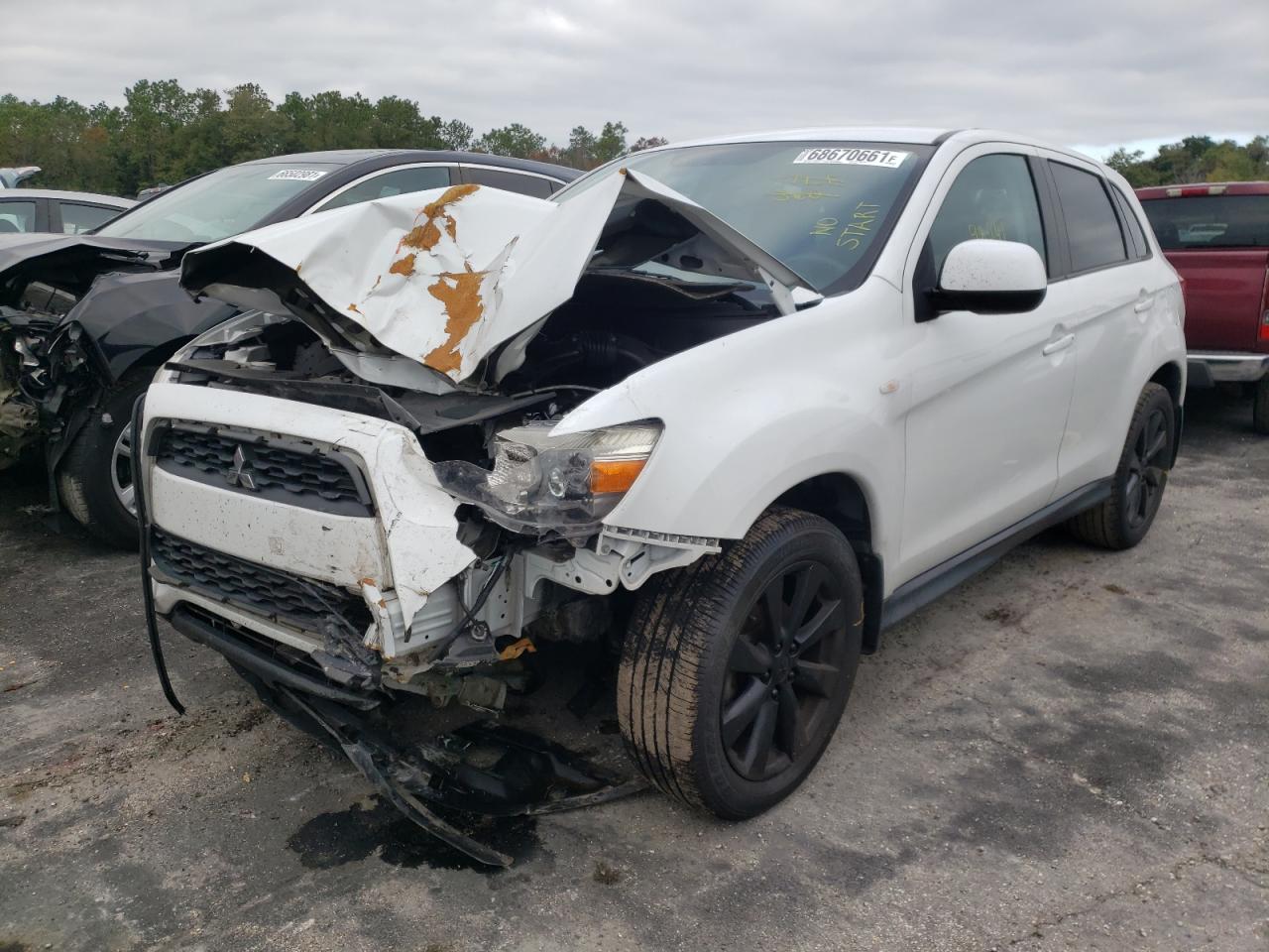 Photo 2 from auction – 2014 MITSUBISHI OUTLANDER with VIN 4A4AP3AU3EE014528
