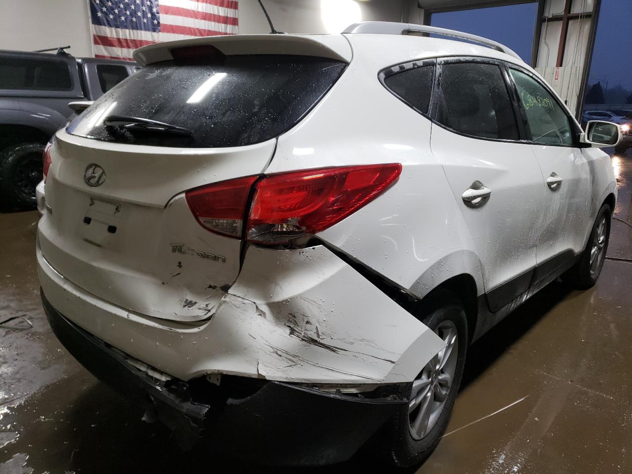 Photo 4 from auction – 2013 HYUNDAI TUCSON with VIN KM8JUCAC4DU627782
