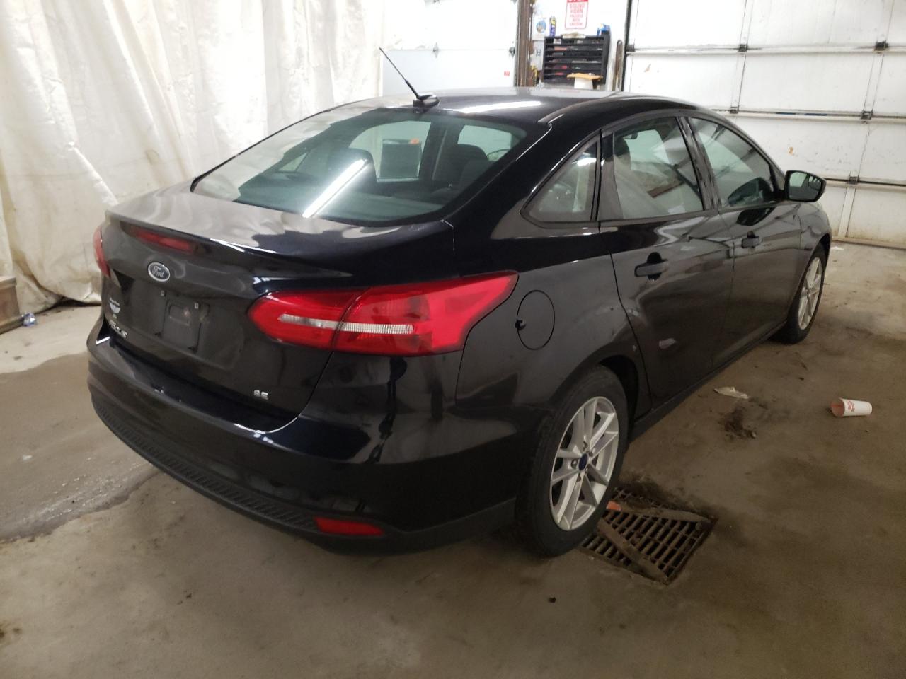 Photo 4 from auction – 2017 FORD FOCUS SE with VIN 1FADP3F20HL315128