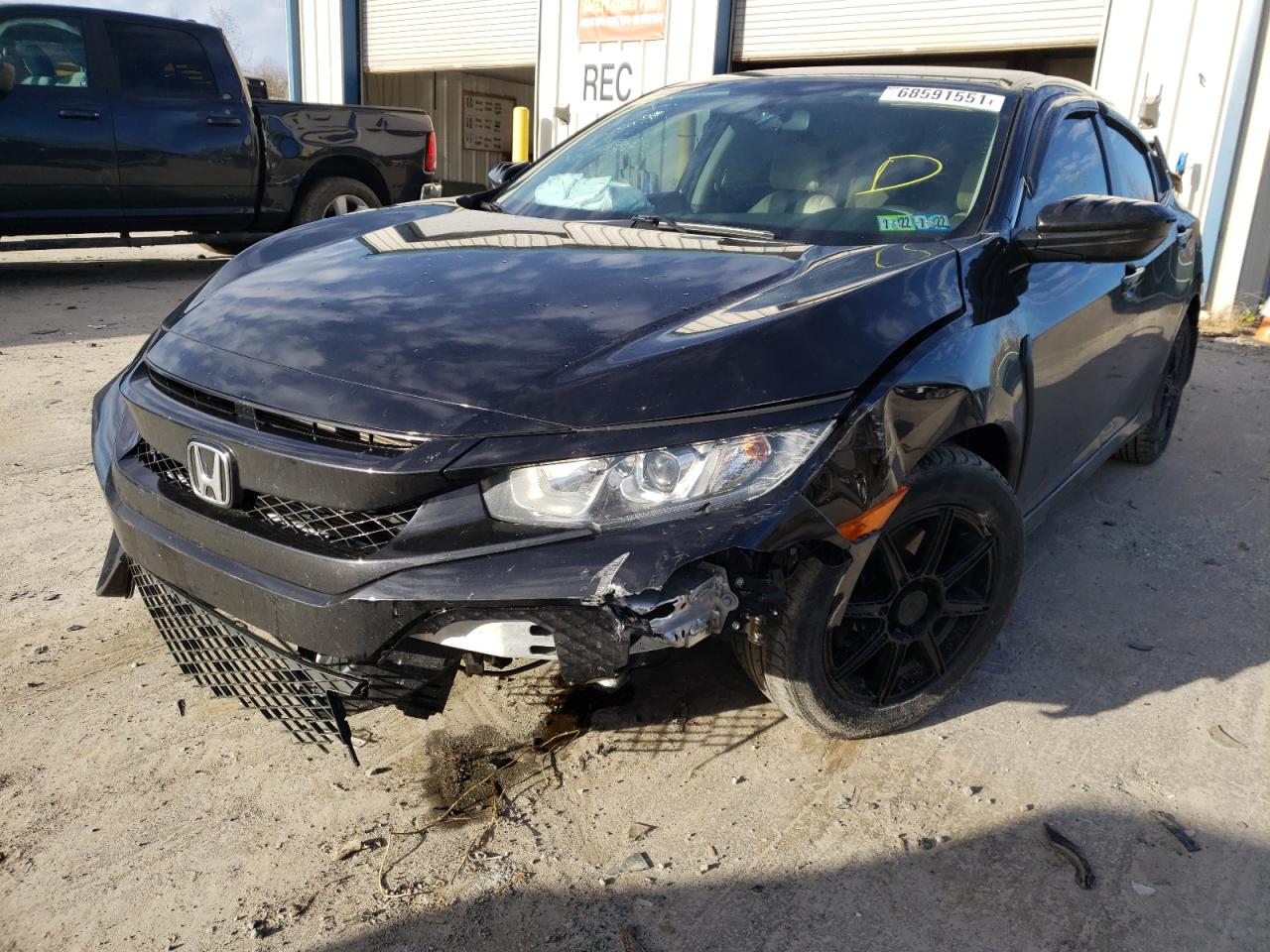 Photo 2 from auction – 2016 HONDA CIVIC LX with VIN 2HGFC2F58GH531745