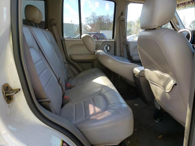 Photo 6 from auction – 2002 JEEP LIBERTY with VIN 1J8GK58K42W303383