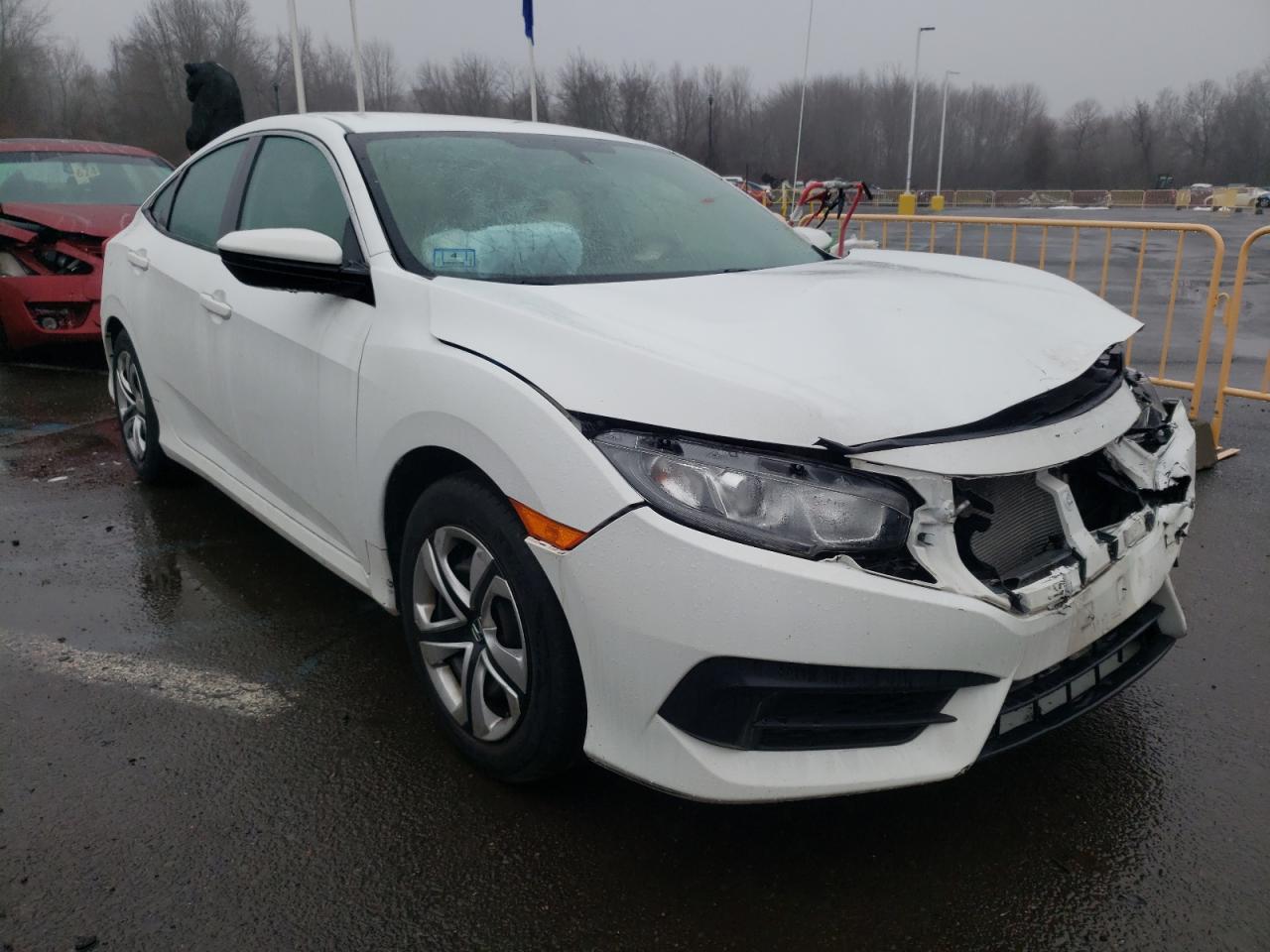 HONDA CIVIC LX 2016 with VIN 19XFC2F57GE238784 - Photo from auction