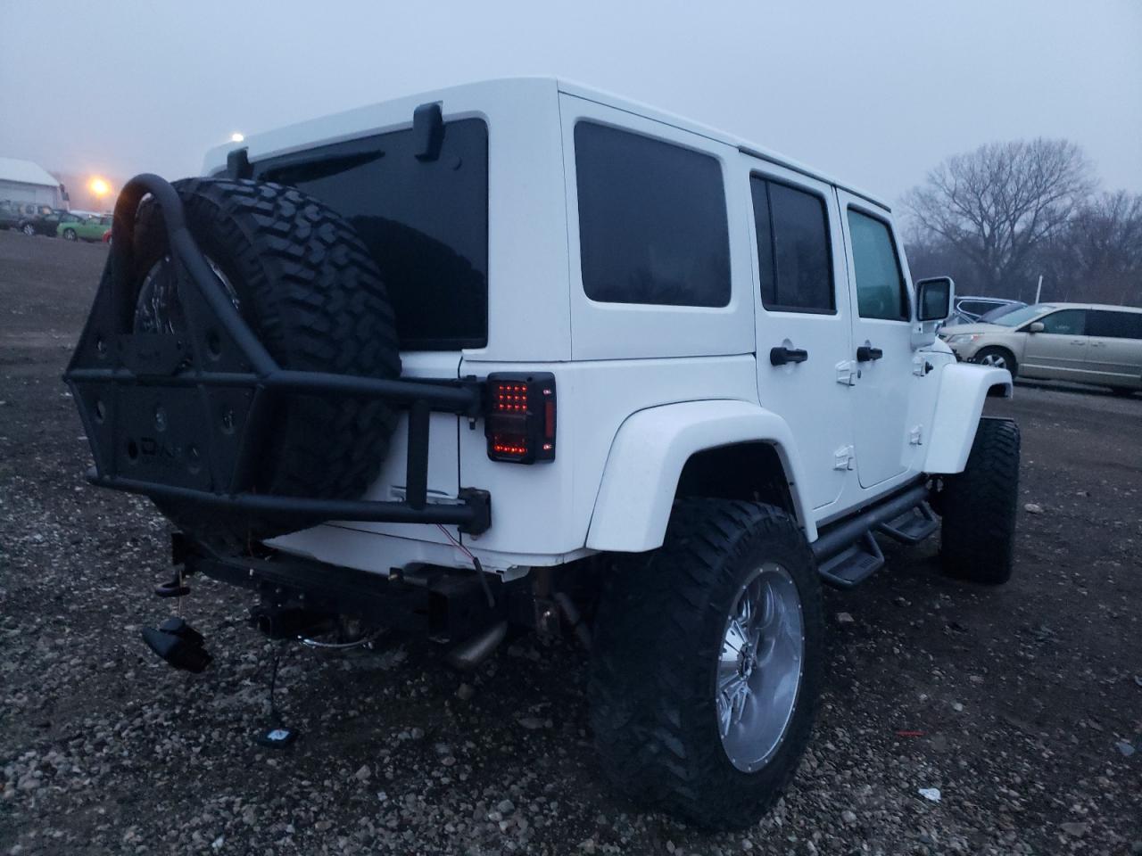 Photo 4 from auction – 2014 JEEP WRANGLER U with VIN 1C4BJWEG7EL160526