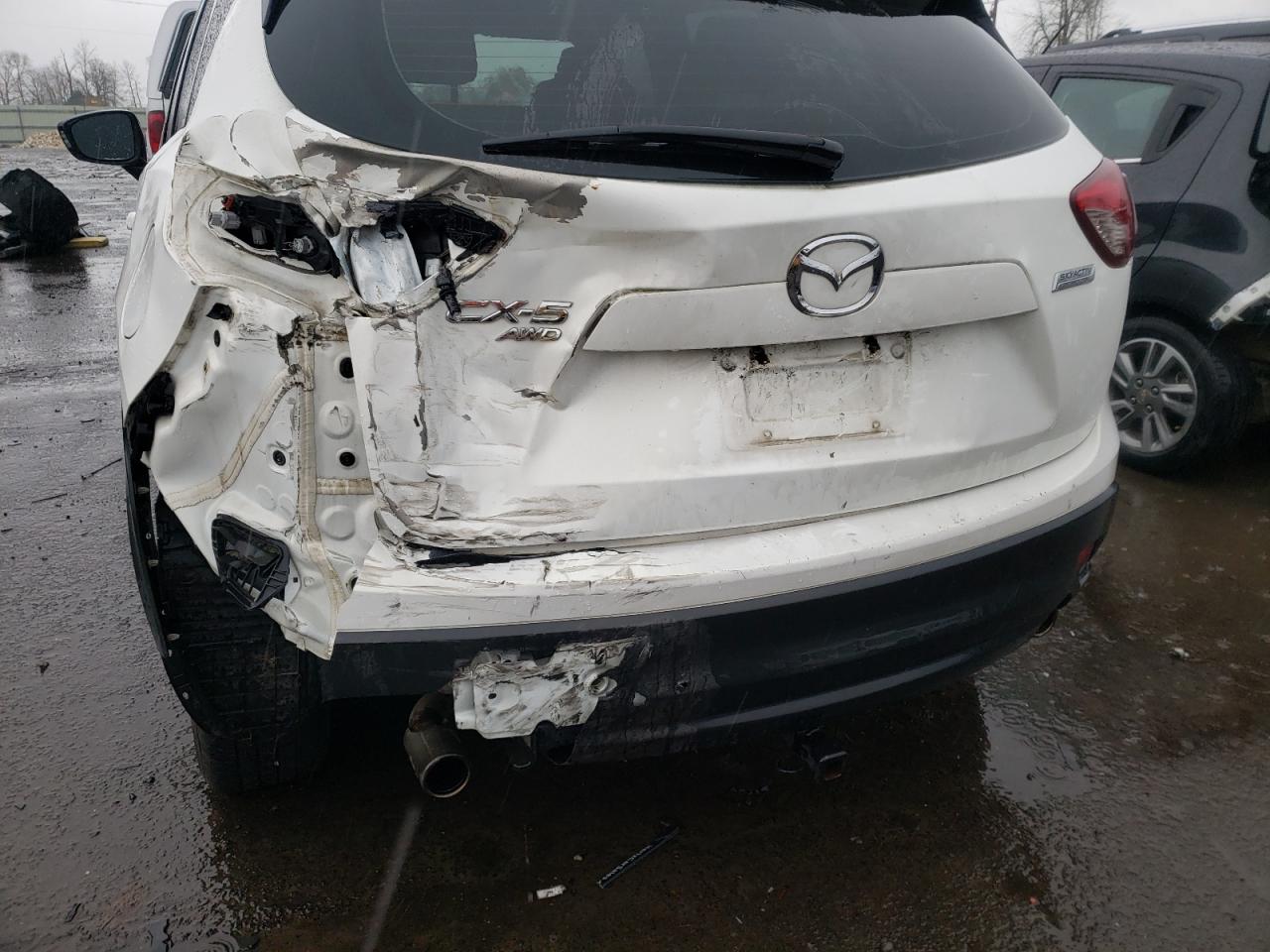 Photo 9 from auction – 2013 MAZDA CX-5 SPORT with VIN JM3KE4BE4D0168909
