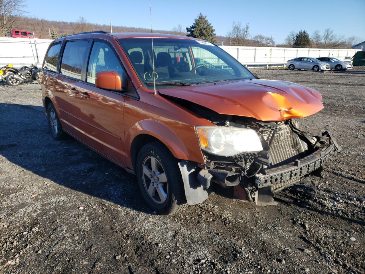 DODGE GRAND CARA 2011 with VIN 2D4RN3DG0BR757297 - Photo from auction
