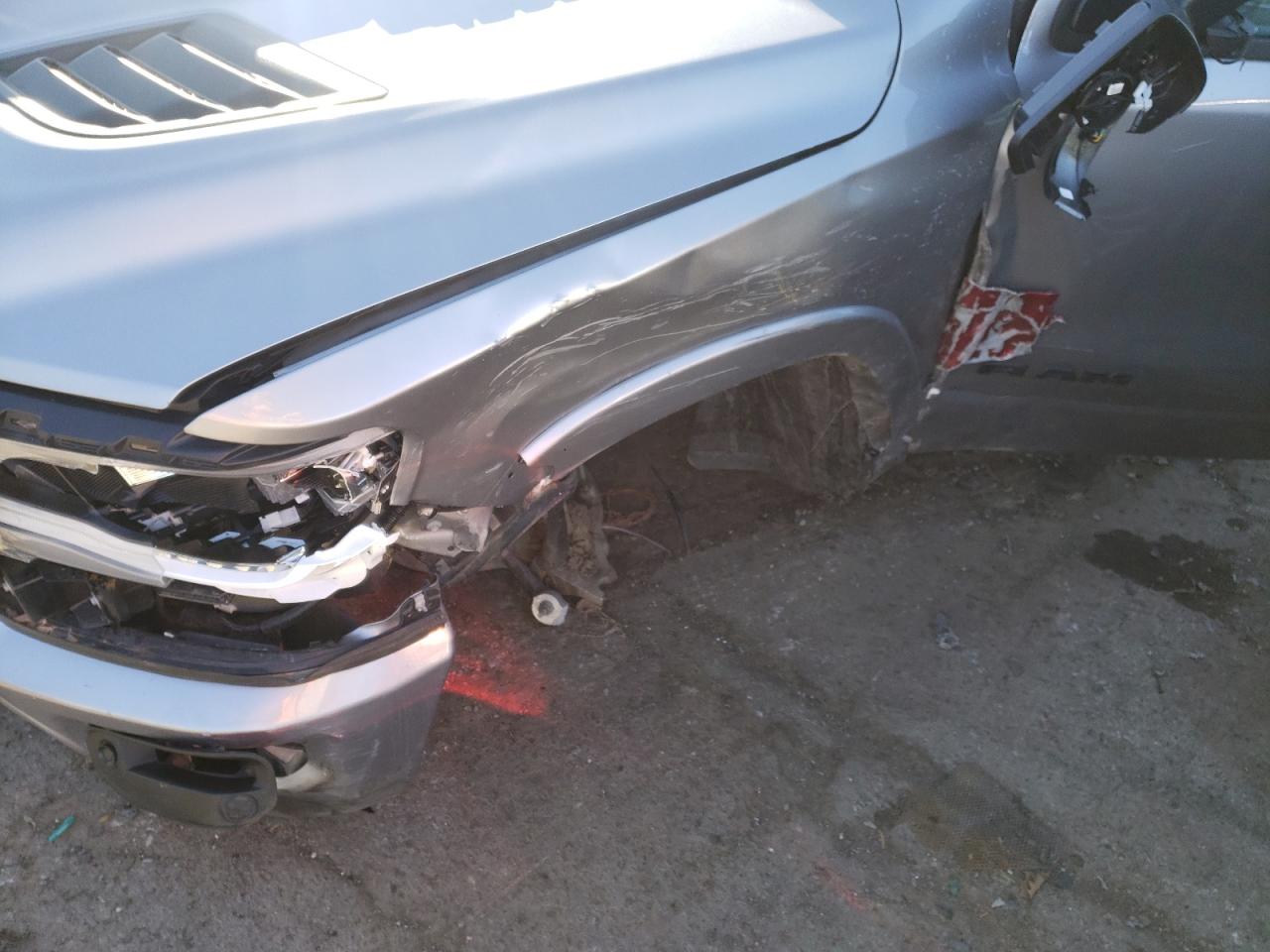 Photo 9 from auction – 2021 RAM 1500 LARAM with VIN 1C6SRFJTXMN624608