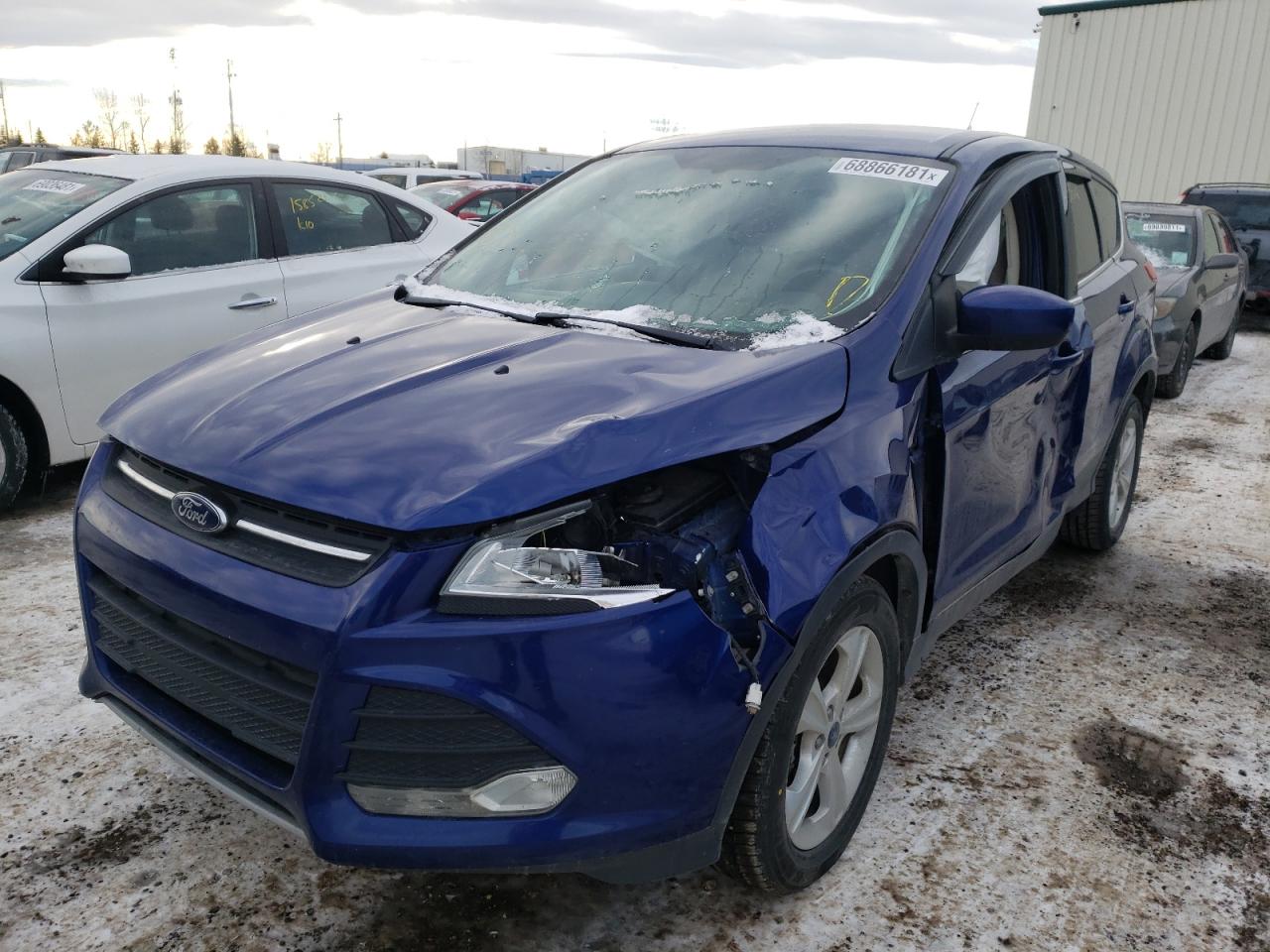 Photo 2 from auction – 2015 FORD ESCAPE SE with VIN 1FMCU9GX2FUA33104