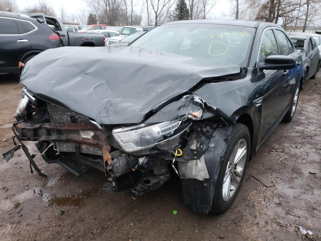 Photo 2 from auction – 2014 FORD TAURUS SEL with VIN 1FAHP2H87EG166153
