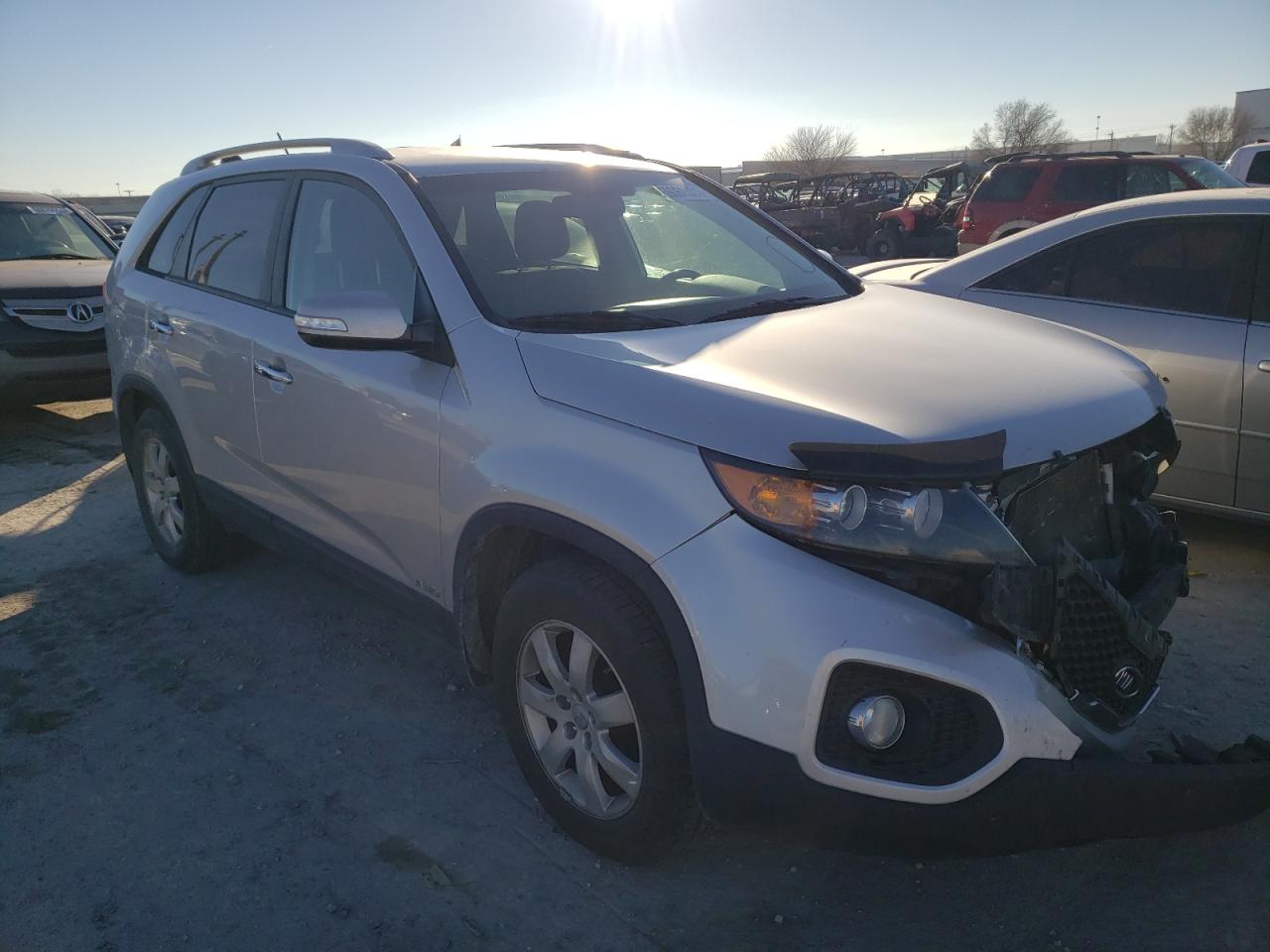 KIA SORENTO LX 2013 with VIN 5XYKTDA20DG423913 - Photo from auction