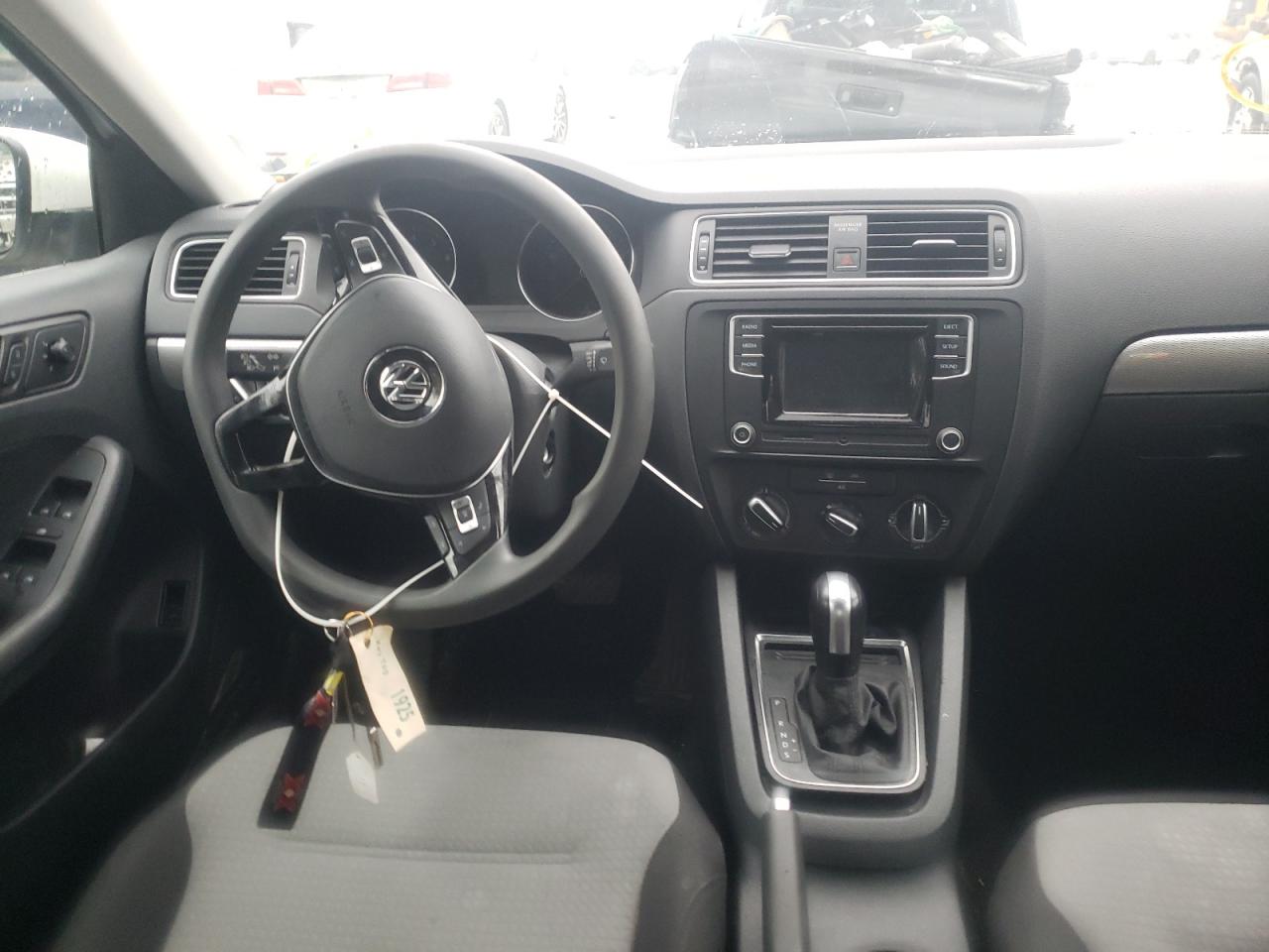 Photo 9 from auction – 2017 VOLKSWAGEN JETTA S with VIN 3VW2B7AJ2HM408265