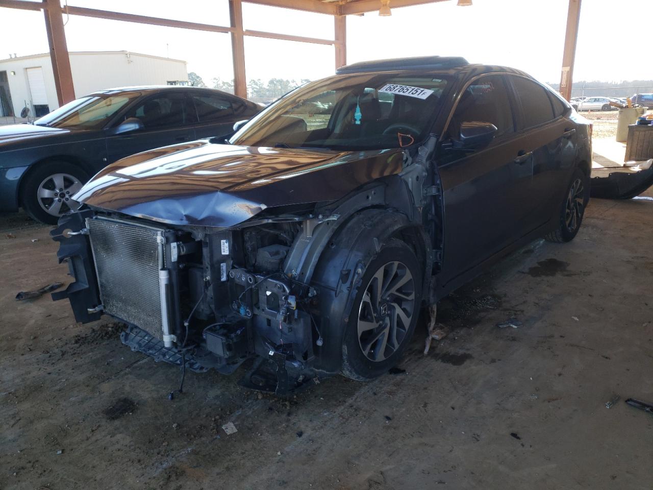 Photo 2 from auction – 2016 HONDA CIVIC EX with VIN 19XFC2F81GE047176