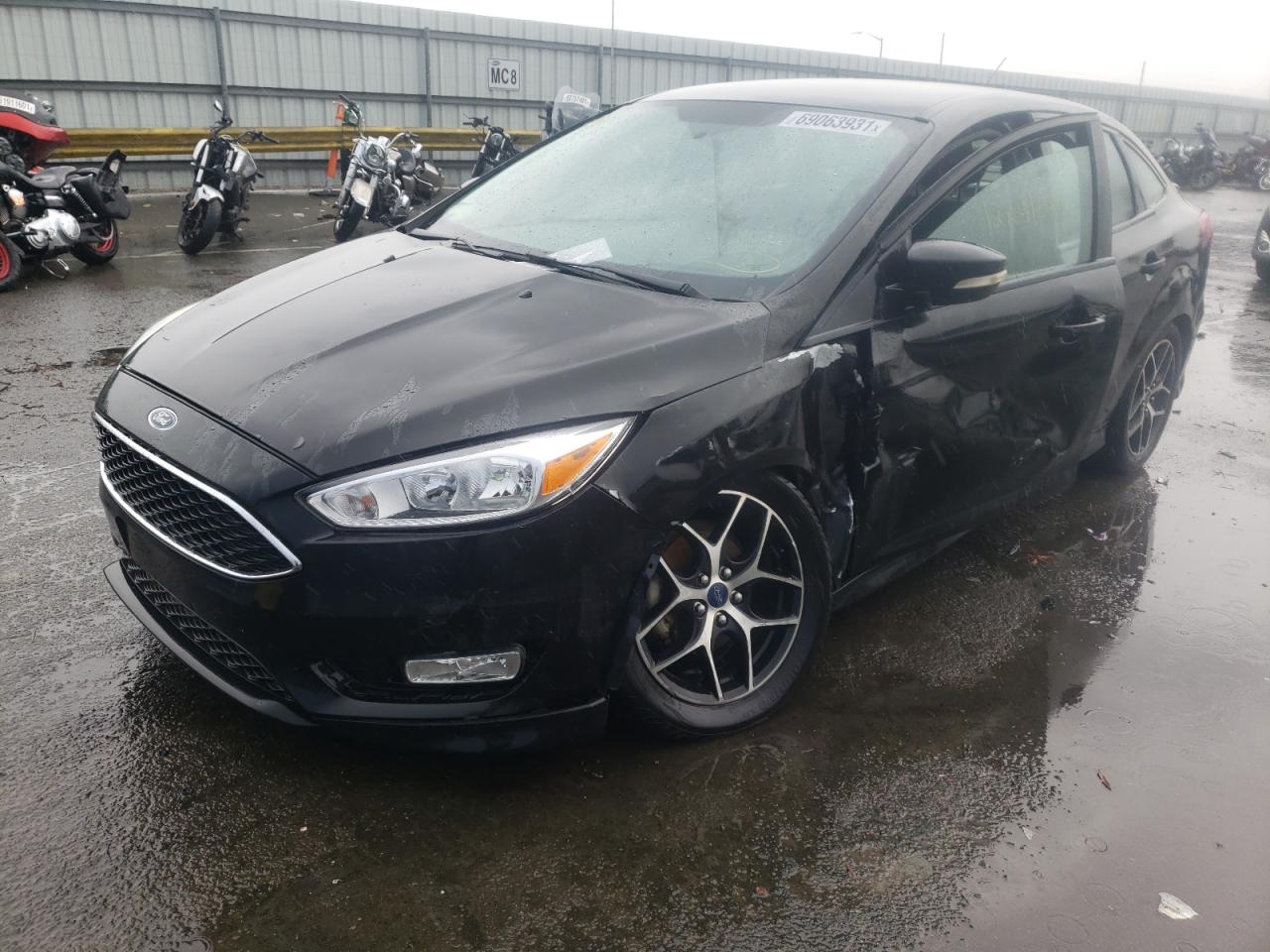 Photo 2 from auction – 2015 FORD FOCUS SE with VIN 1FADP3F27FL235547