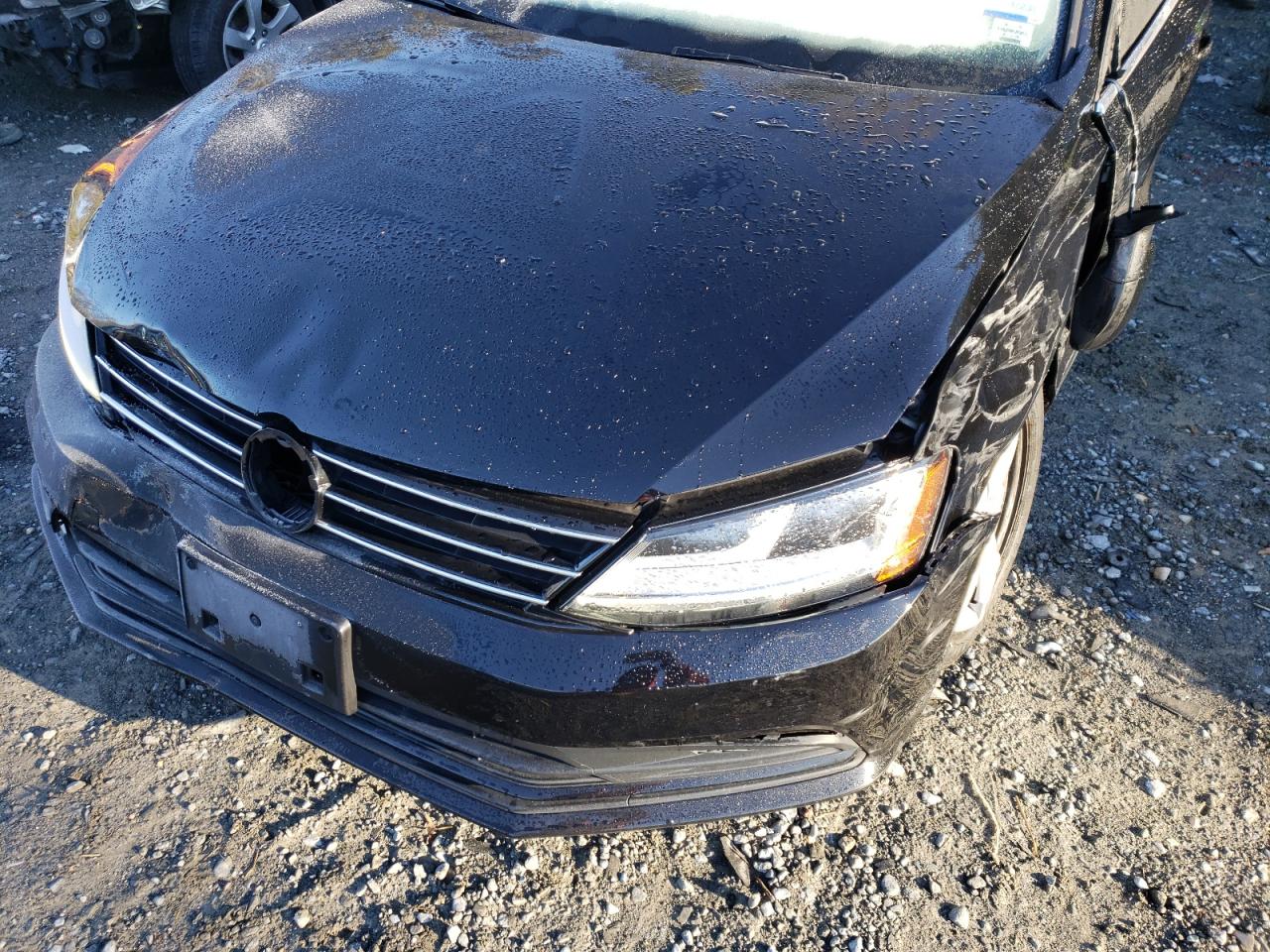 Photo 9 from auction – 2017 VOLKSWAGEN JETTA S with VIN 3VW2B7AJ1HM301045