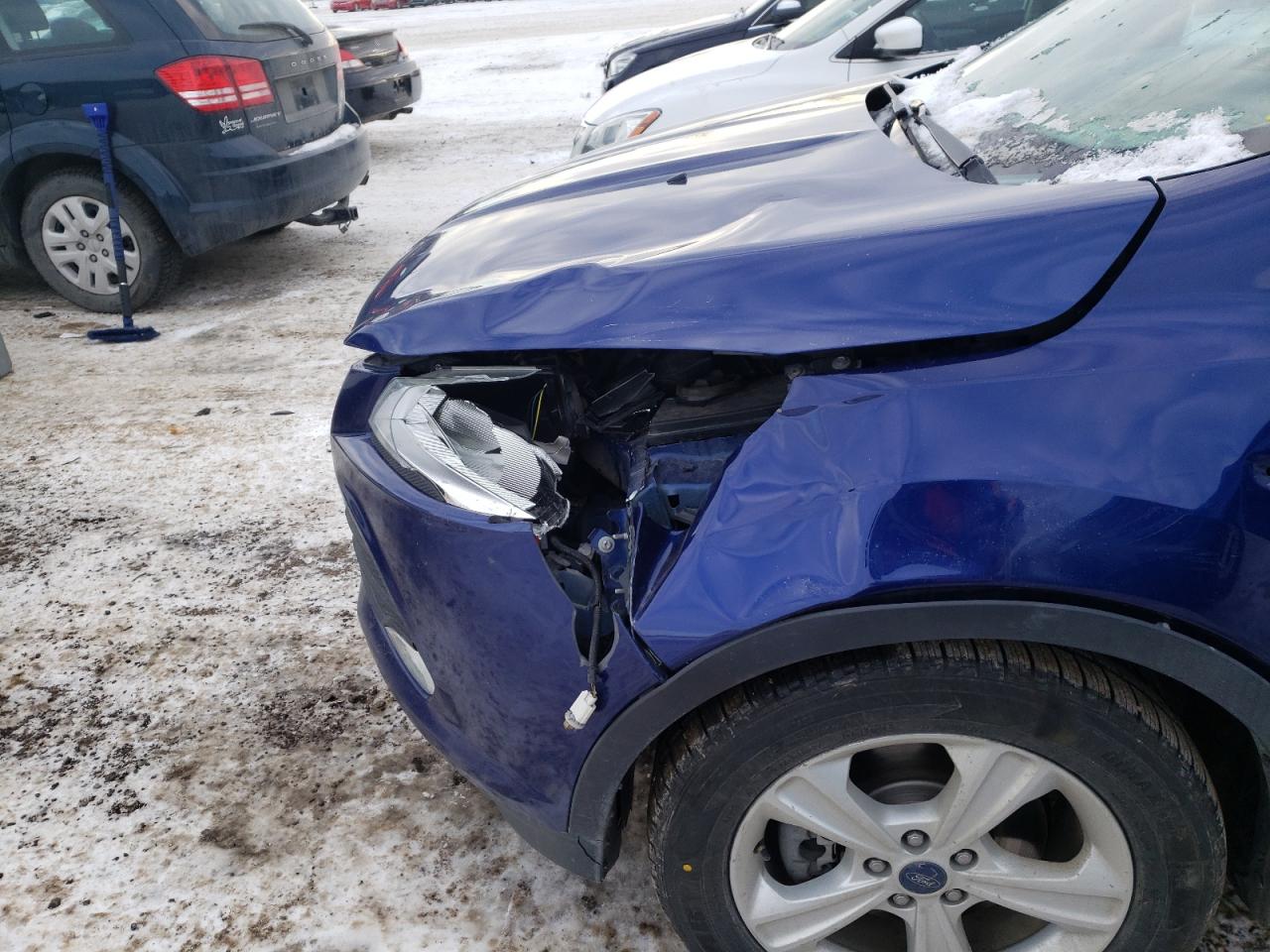 Photo 9 from auction – 2015 FORD ESCAPE SE with VIN 1FMCU9GX2FUA33104