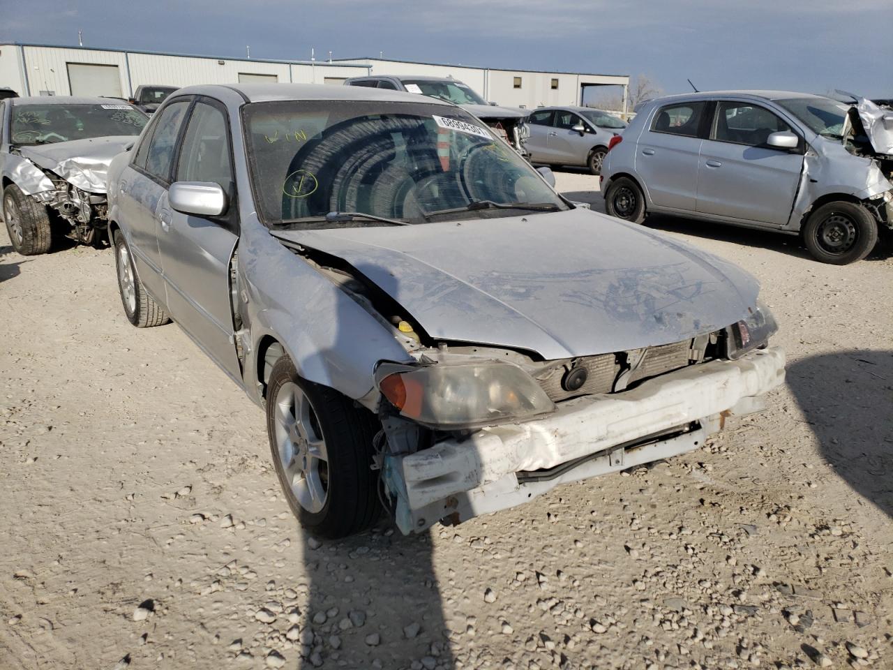 MAZDA PROTEGE DX 2003 with VIN JM1BJ225230193055 - Photo from auction