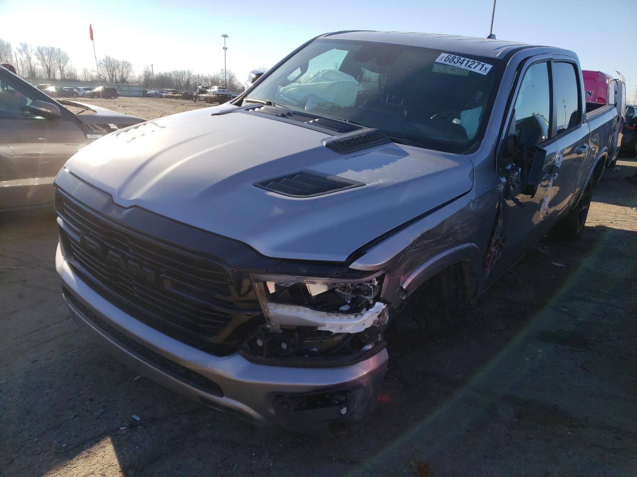 Photo 2 from auction – 2021 RAM 1500 LARAM with VIN 1C6SRFJTXMN624608