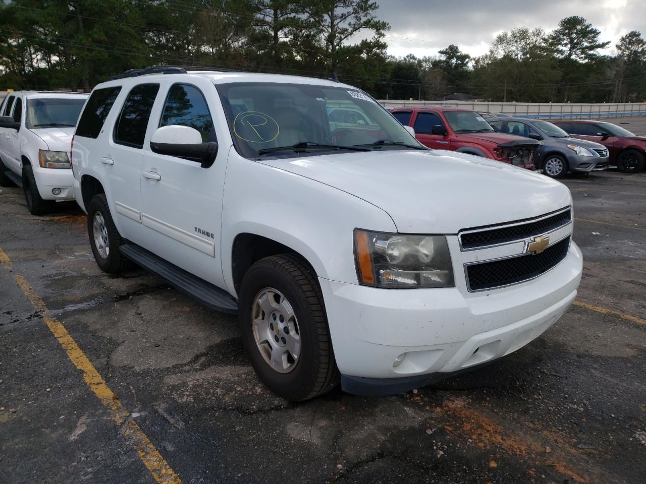 CHEVROLET TAHOE C150 2011 with VIN 1GNSCBE02BR143042 - Photo from auction