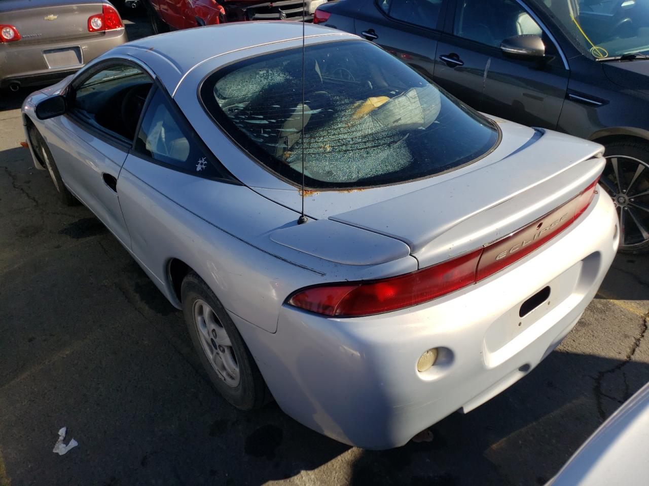 Photo 3 from auction – 1998 MITSUBISHI ECLIPSE RS with VIN 4A3AK34Y5WE050174