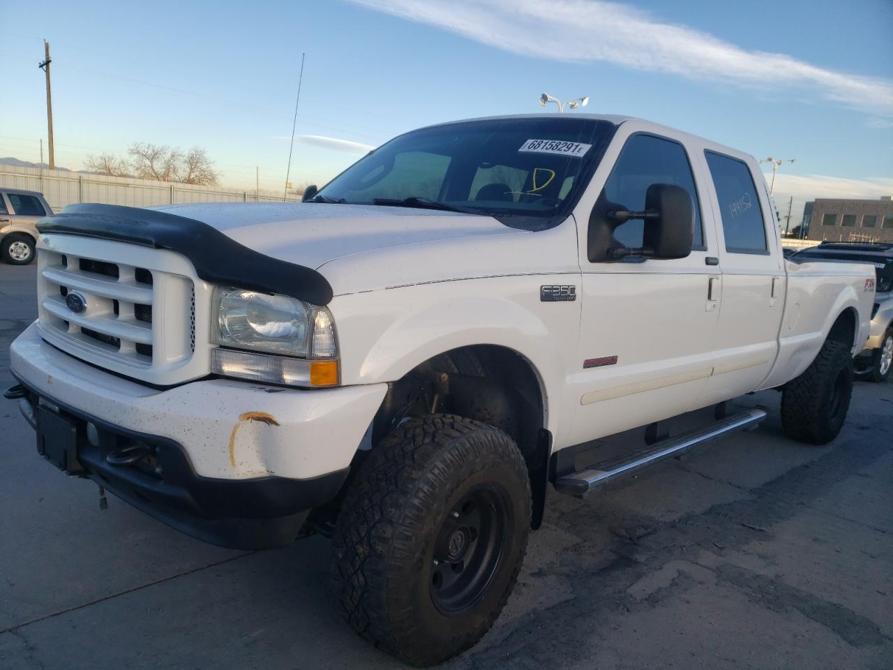 Photo 2 from auction – 2004 FORD F350 SRW S with VIN 1FTSW31P14EA98663