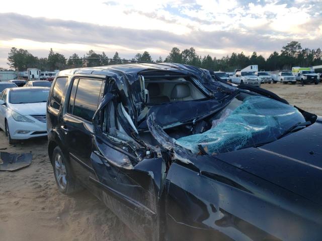 Photo 9 from auction – 2014 HONDA PILOT EXLN with VIN 5FNYF4H71EB025430