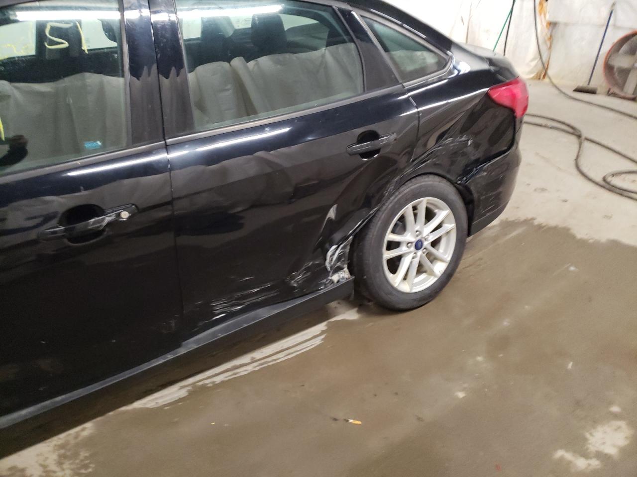 Photo 9 from auction – 2017 FORD FOCUS SE with VIN 1FADP3F20HL315128