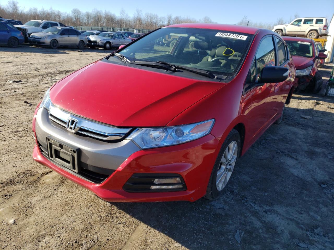 Photo 2 from auction – 2013 HONDA INSIGHT EX with VIN JHMZE2H75DS000042
