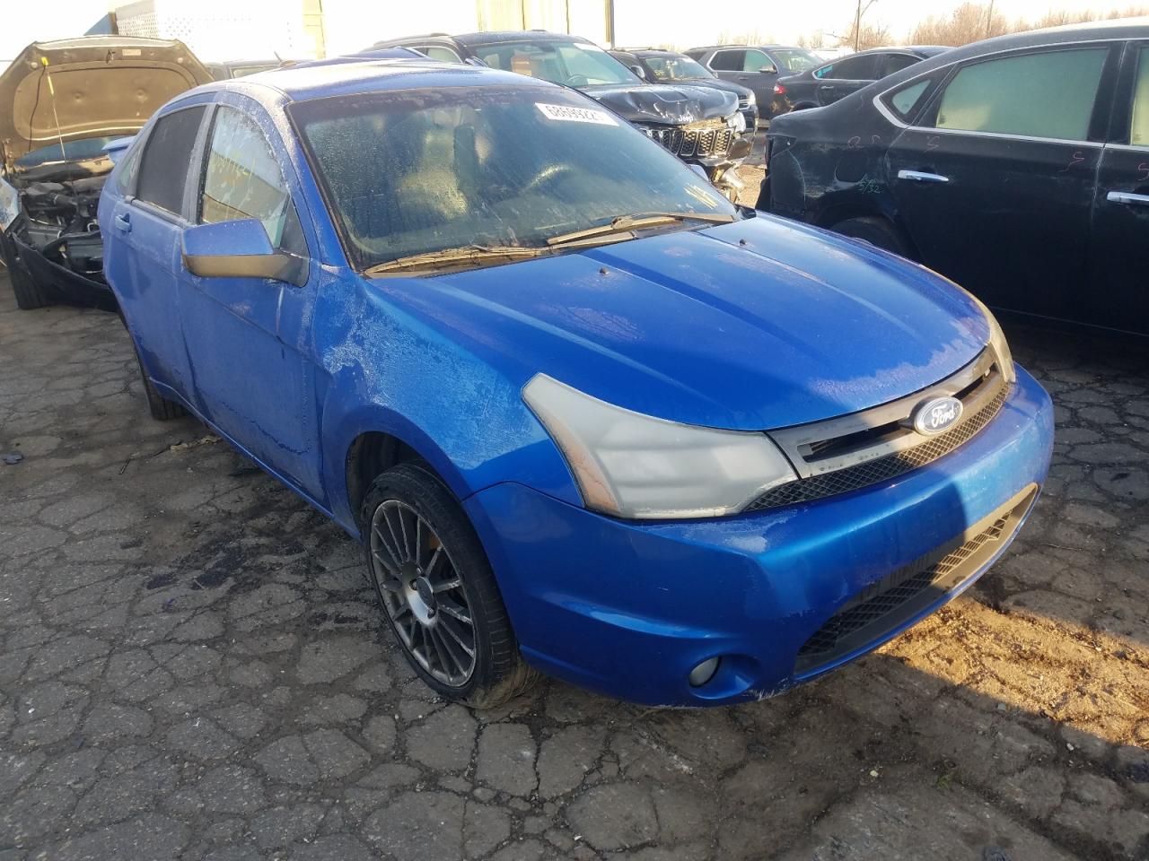 FORD FOCUS SES 2011 with VIN 1FAHP3GN4BW163404 - Photo from auction