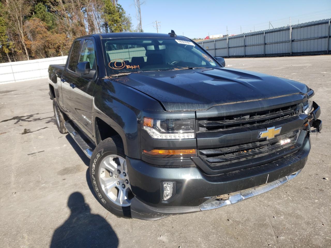 CHEVROLET SILVERADO 2018 with VIN 1GCVKREC2JZ253079 - Photo from auction