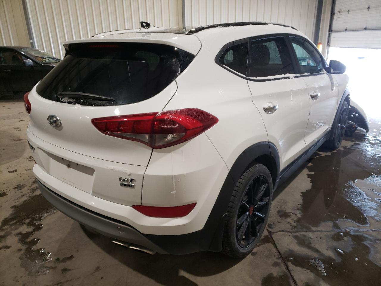 Photo 4 from auction – 2018 HYUNDAI TUCSON VAL with VIN KM8J3CA25JU722843