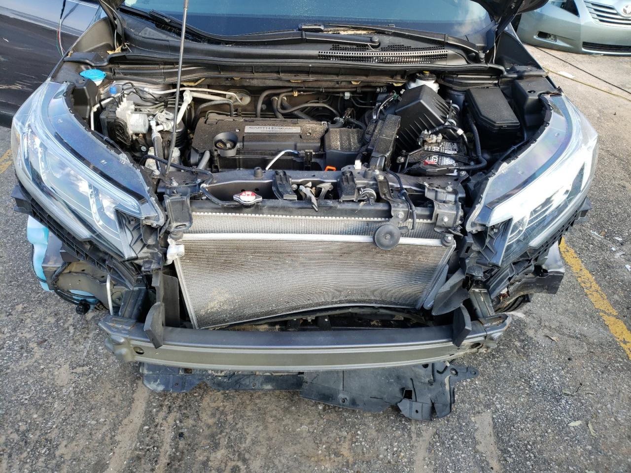 Photo 7 from auction – 2015 HONDA CR-V LX with VIN 5J6RM4H32FL131028