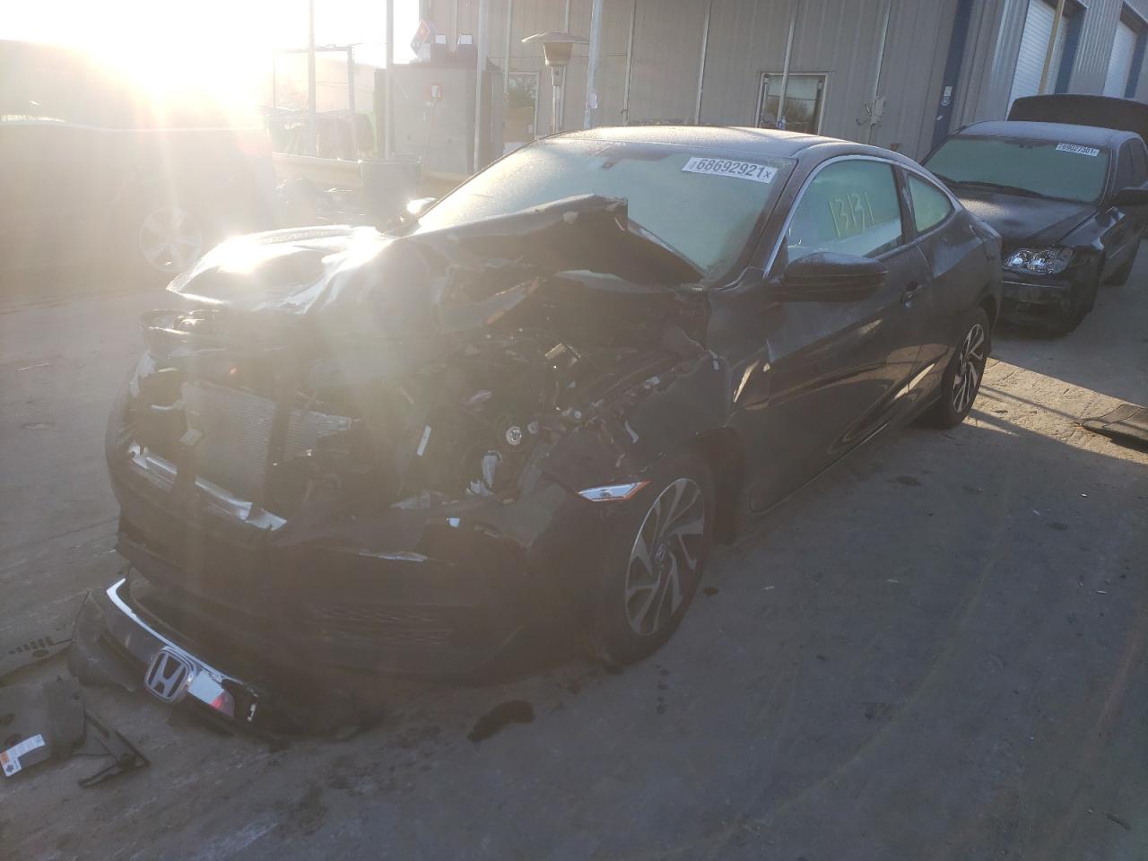 Photo 2 from auction – 2018 HONDA CIVIC LX with VIN 2HGFC4B09JH304870