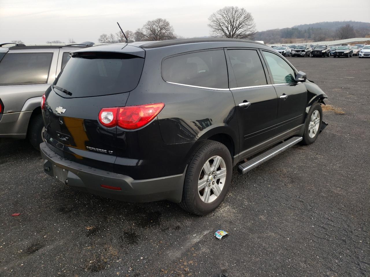 Photo 4 from auction – 2011 CHEVROLET TRAVERSE L with VIN 1GNKVJED9BJ174360