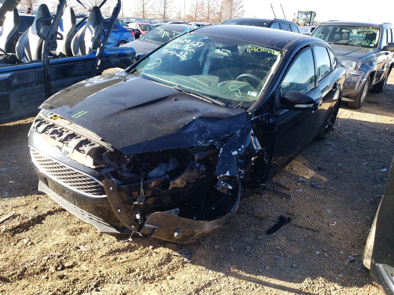 Photo 2 from auction – 2016 FORD FOCUS SE with VIN 1FADP3F28GL262158
