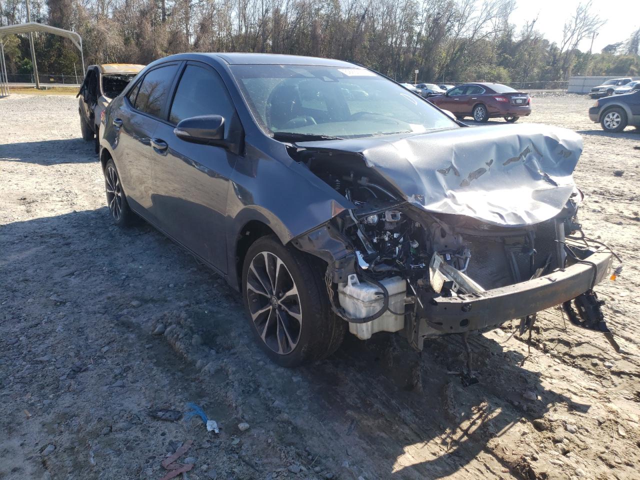 TOYOTA COROLLA L 2017 with VIN 2T1BURHEXHC899291 - Photo from auction