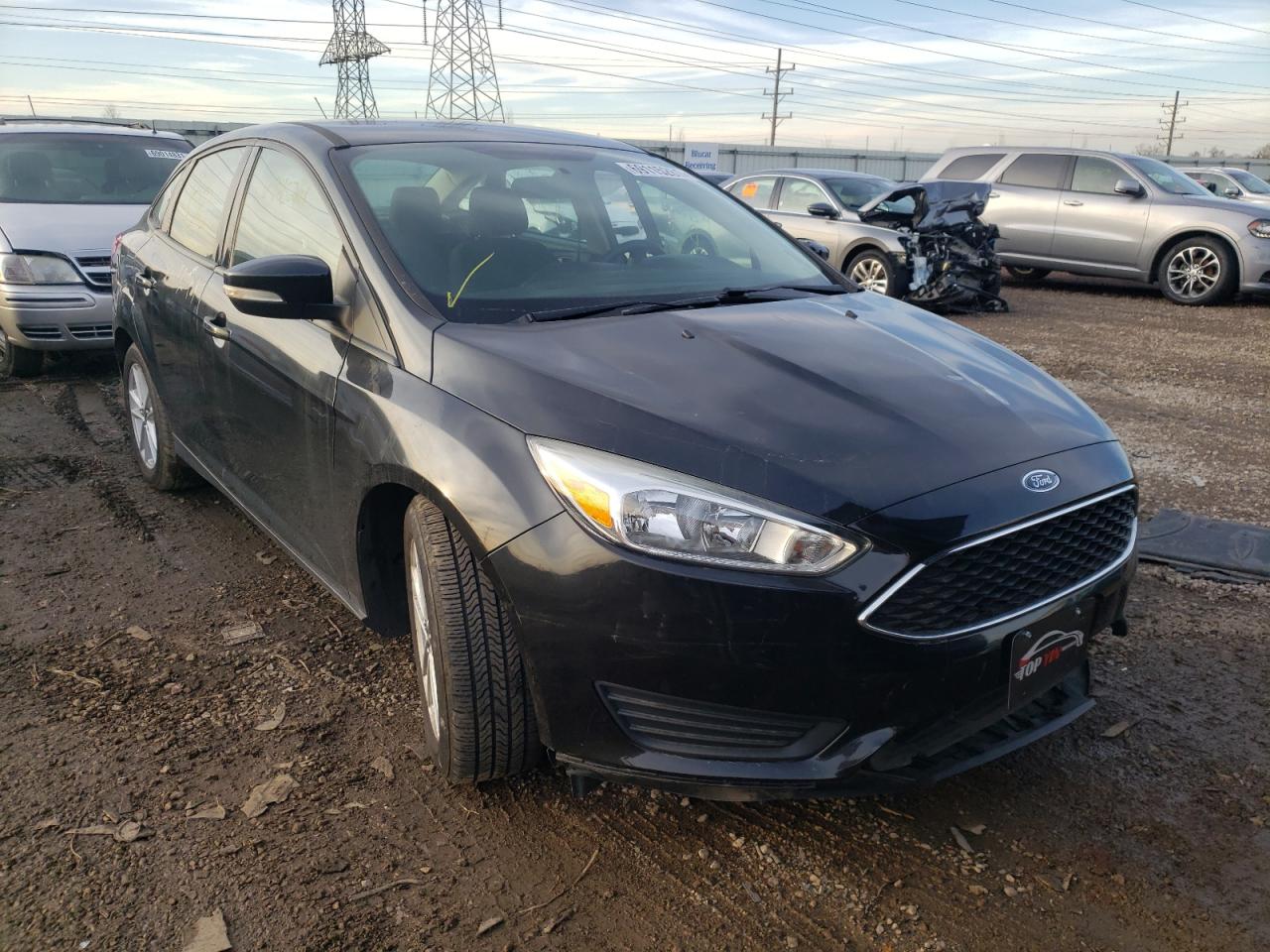 FORD FOCUS SE 2015 with VIN 1FADP3F23FL304993 - Photo from auction