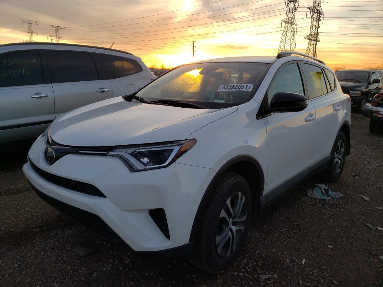 Photo 2 from auction – 2017 TOYOTA RAV4 LE with VIN 2T3BFREV5HW609303
