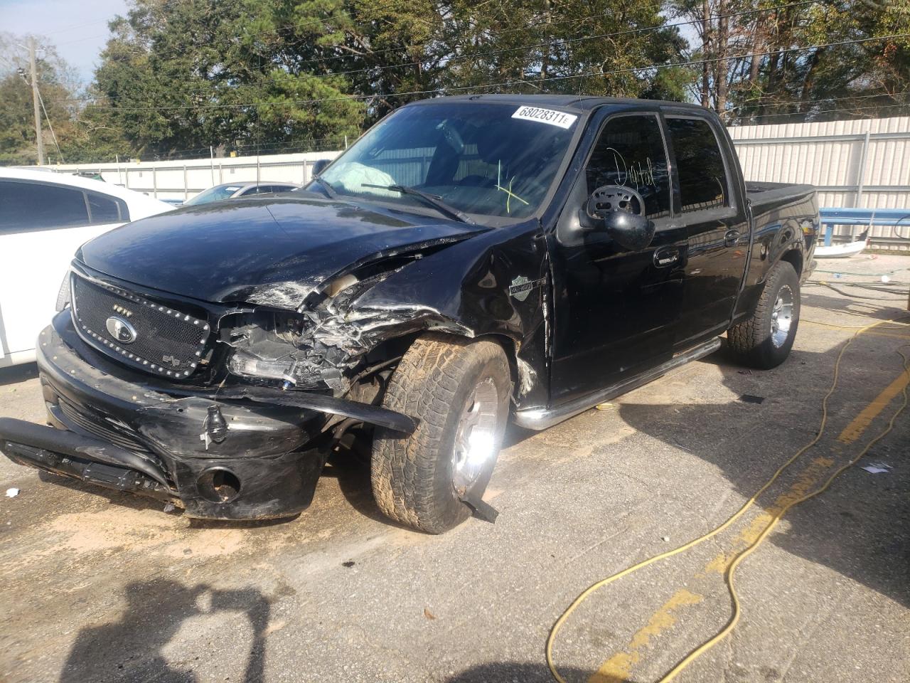 Photo 2 from auction – 2001 FORD F150 SUPER with VIN 1FTRW07L41KA90359