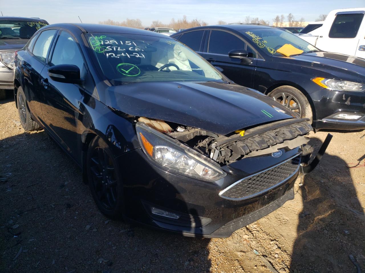 FORD FOCUS SE 2016 with VIN 1FADP3F28GL262158 - Photo from auction