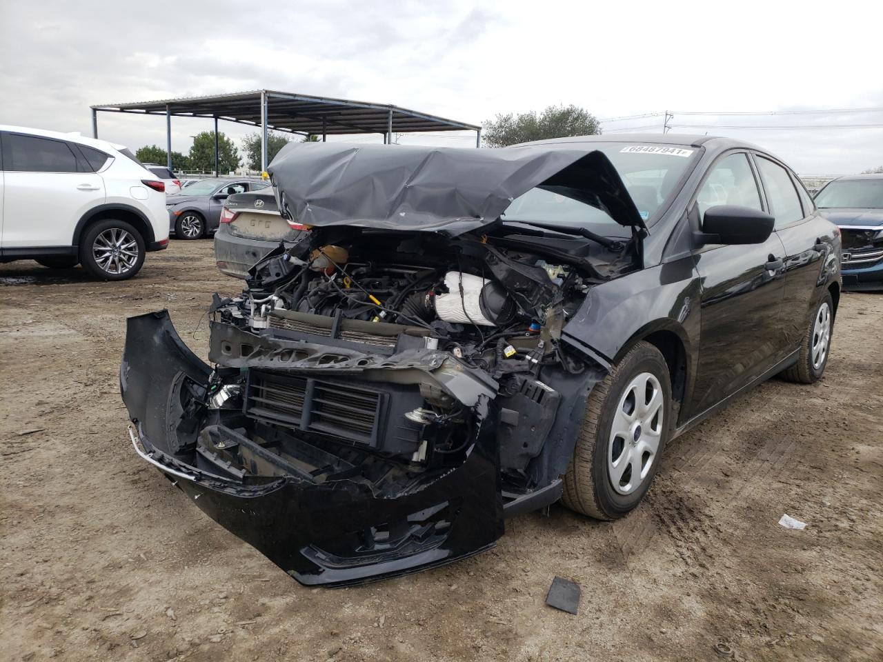 Photo 2 from auction – 2016 FORD FOCUS S with VIN 1FADP3E23GL249027