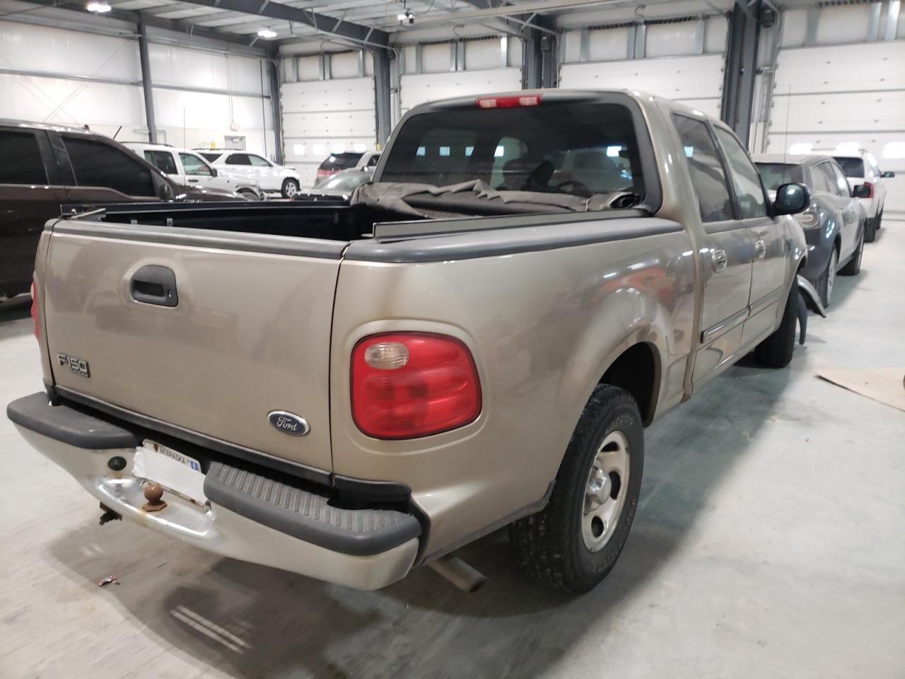 Photo 4 from auction – 2002 FORD F150 SUPER with VIN 1FTRW07602KD39980