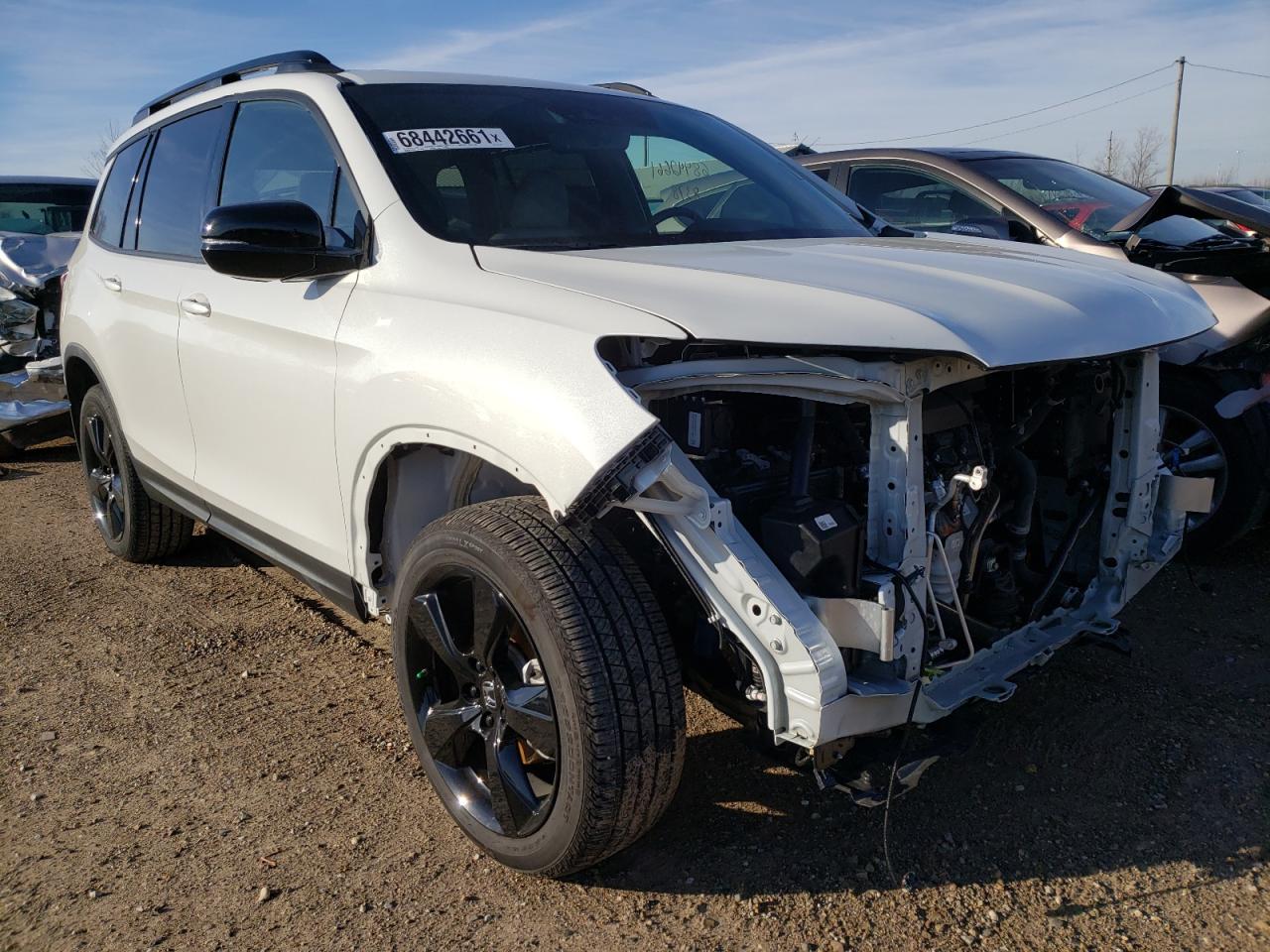 HONDA PASSPORT E 2021 مع رقم تعريف المركبة 5FNYF8H06MB007255 - صورة من المزاد