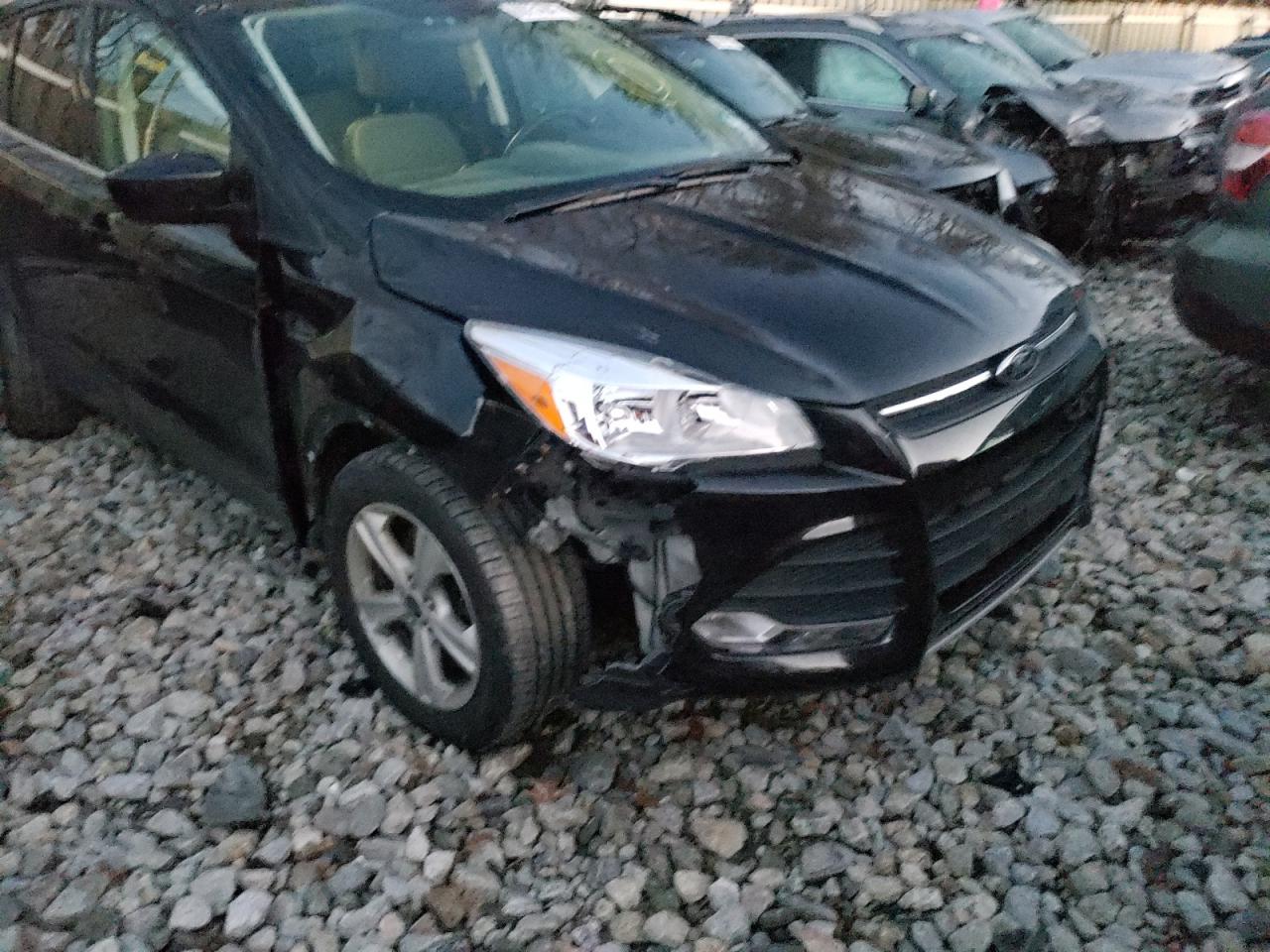 Zdjęcie 9 z aukcji – 2014 FORD ESCAPE SE z VIN 1FMCU9GX2EUD40917
