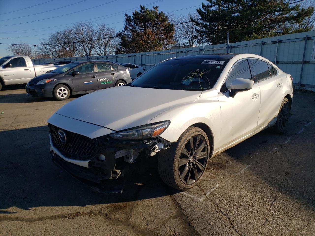 Photo 2 from auction – 2019 MAZDA 6 TOURING with VIN JM1GL1VM0K1503242