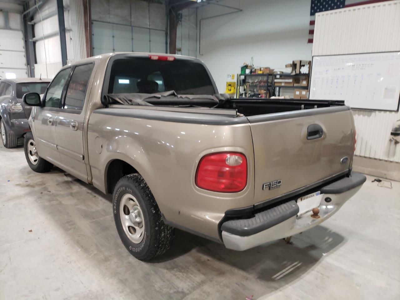 Photo 3 from auction – 2002 FORD F150 SUPER with VIN 1FTRW07602KD39980