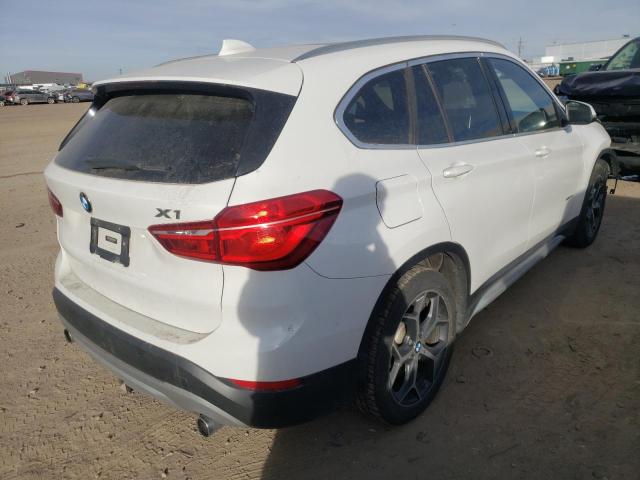 Photo 4 from auction – 2017 BMW X1 XDRIVE2 with VIN WBXHT3C3XH5F72828