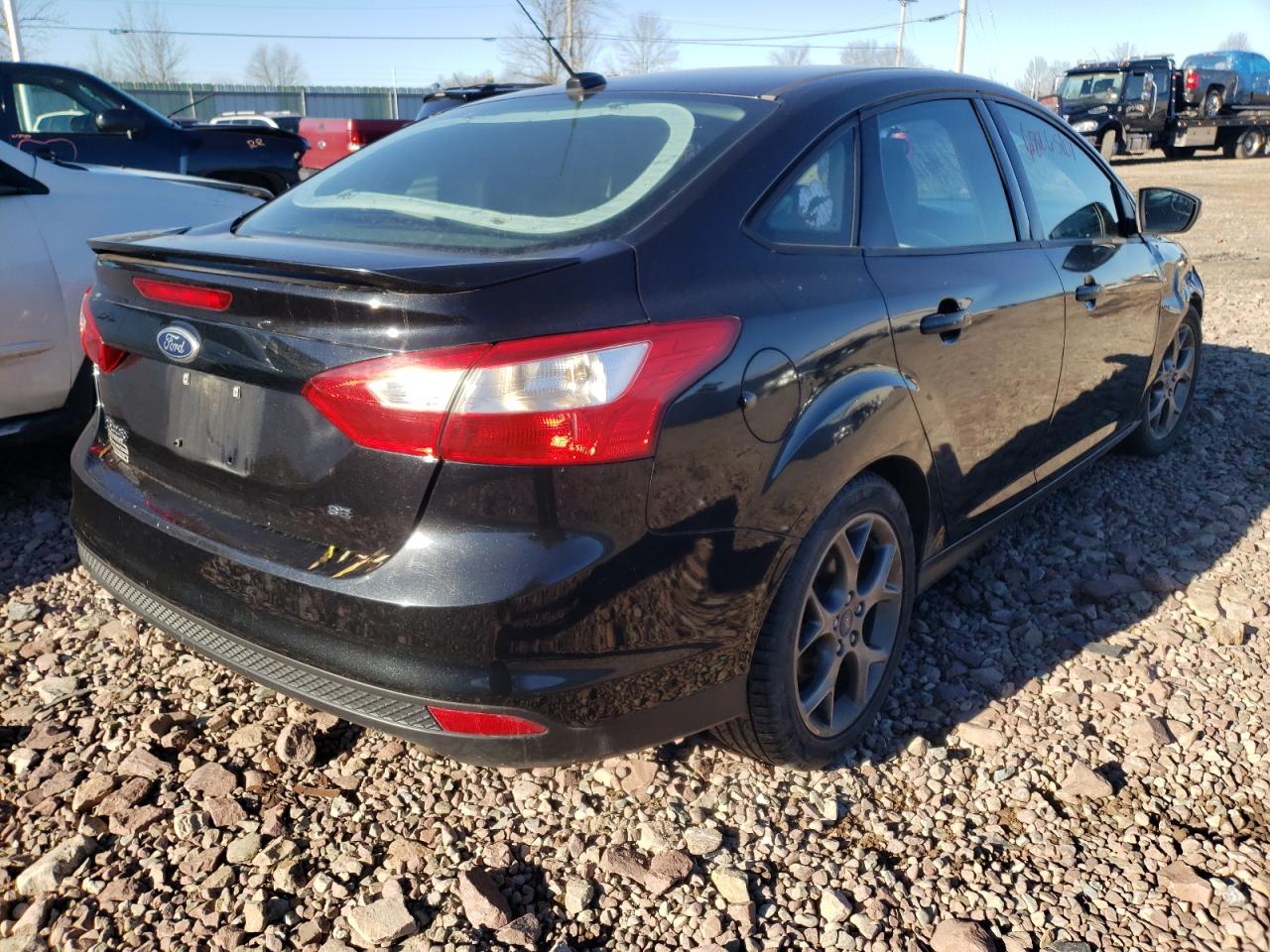 Foto 4 de la subasta – 2013 FORD FOCUS SE con VIN 1FADP3F21DL103283