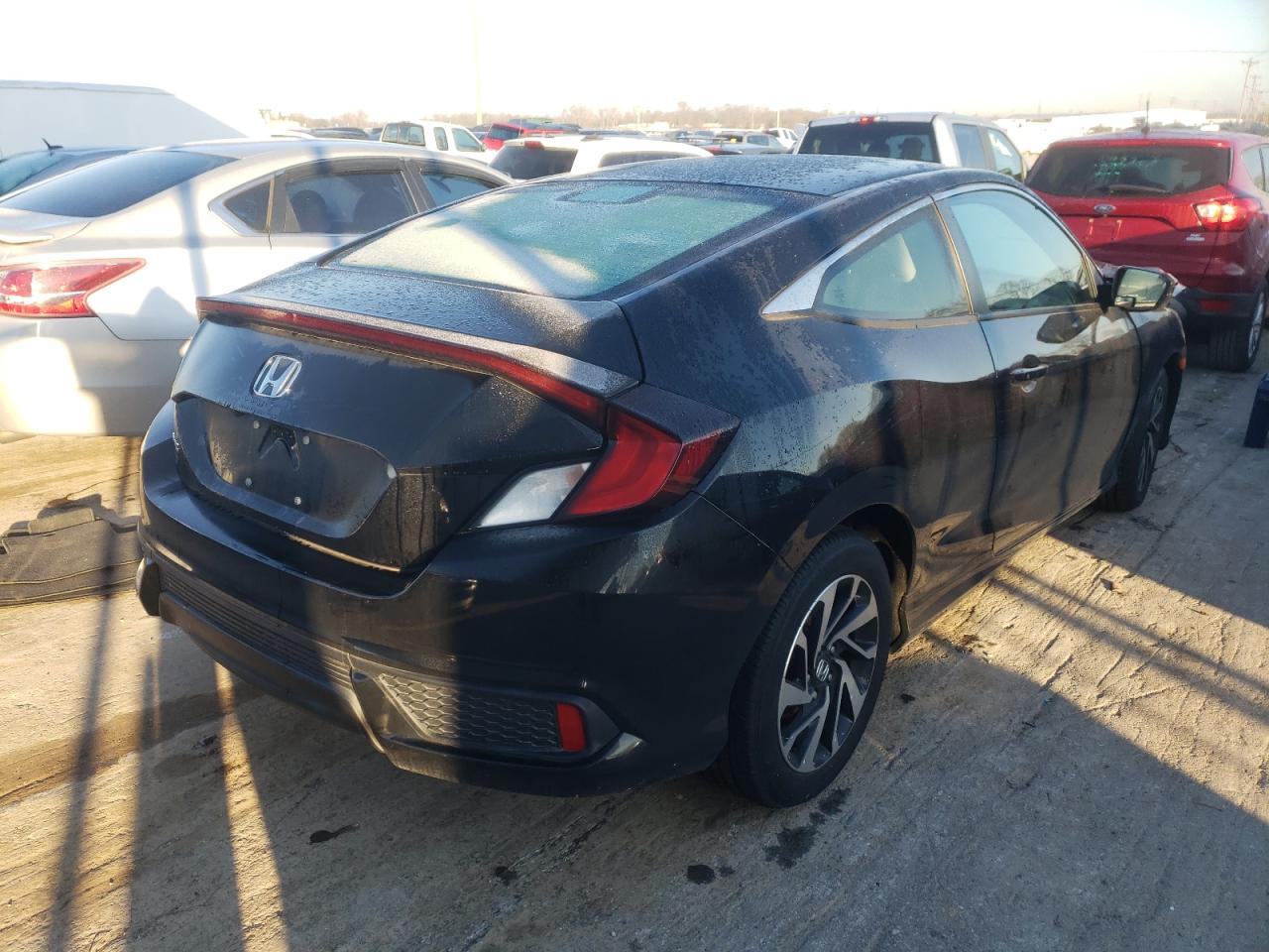Photo 4 from auction – 2018 HONDA CIVIC LX with VIN 2HGFC4B09JH304870