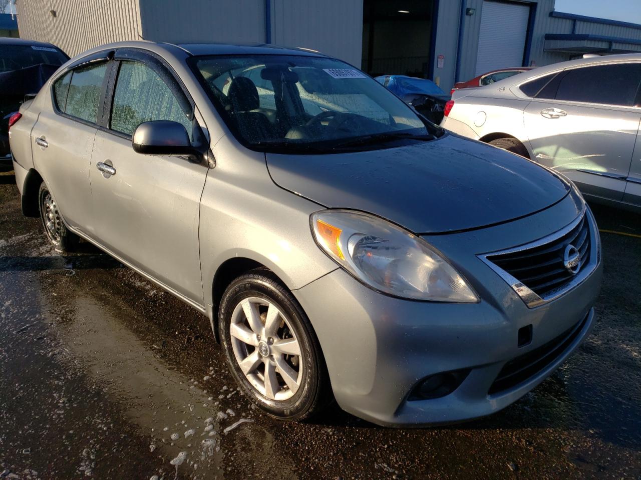 NISSAN VERSA S 2012 with VIN 3N1CN7AP7CL878621 - Photo from auction